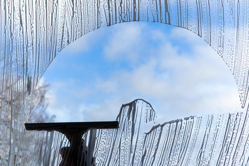 Cleaning a window of a commercial building